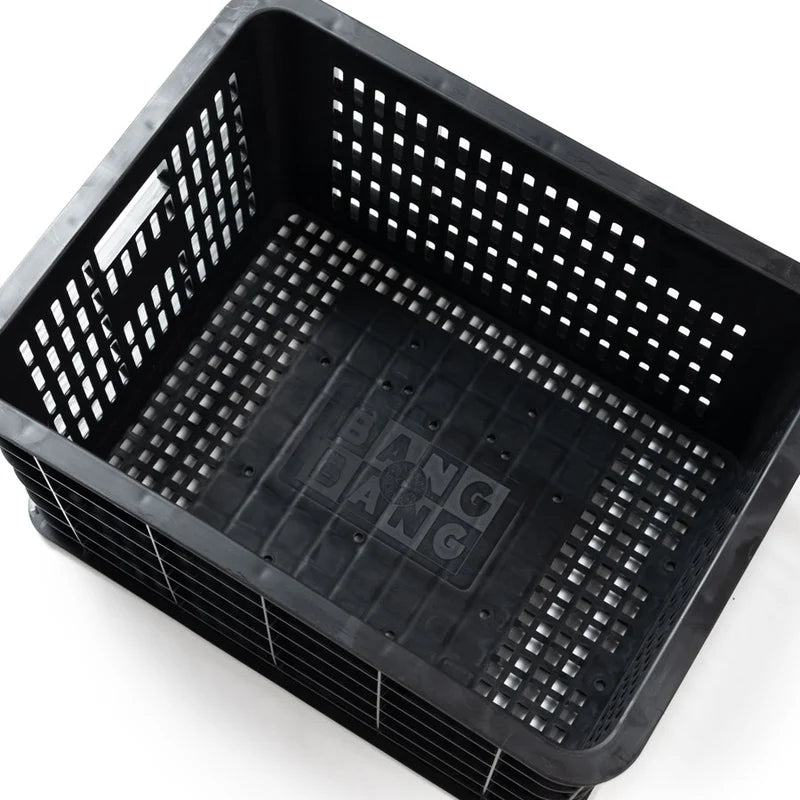 Close up of the inside of a black lastic basket