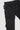 Black pants with textured patches on a light gray background, showing the padding that comes with the pants