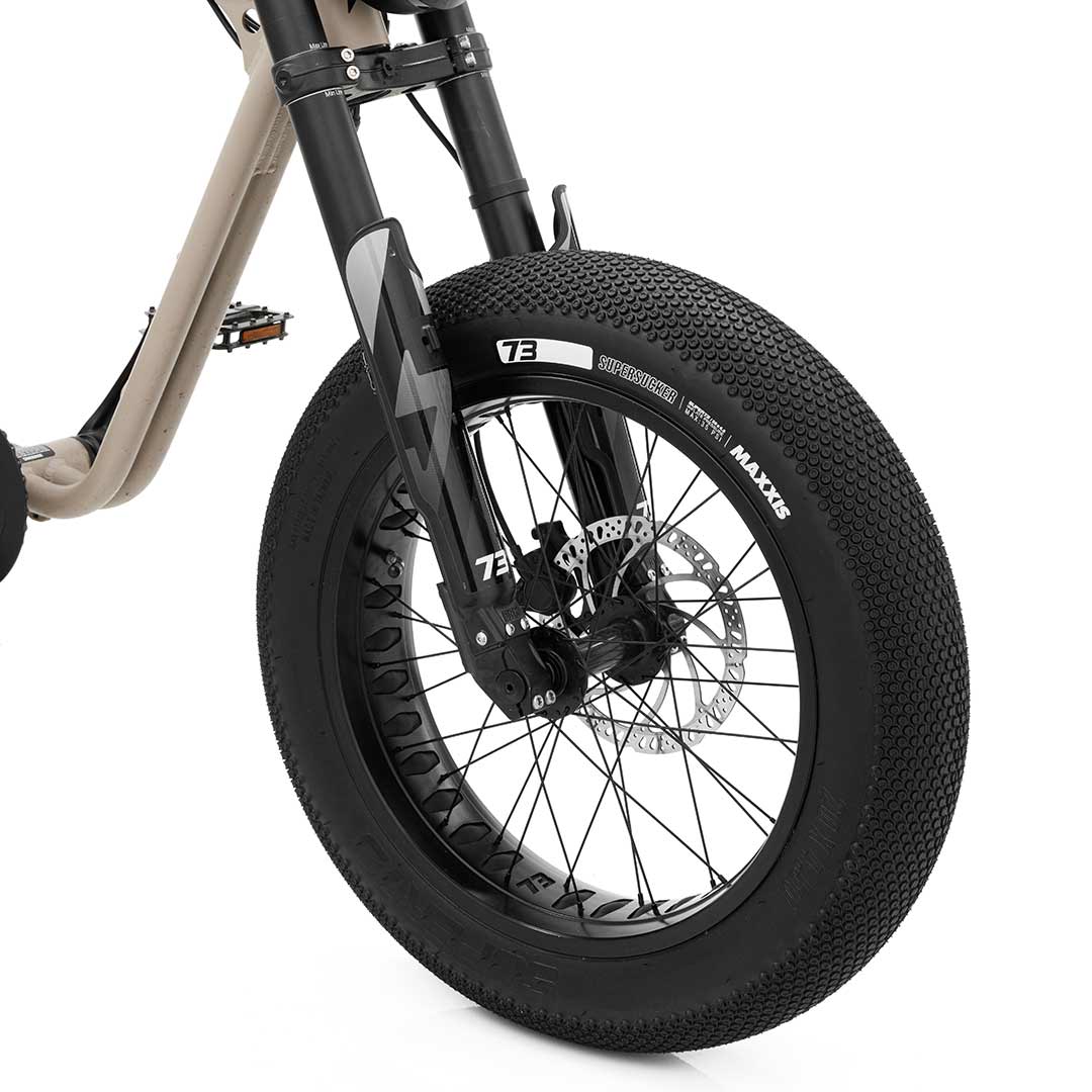 MAXXIS SuperSucker tire mounted on an electric bike, highlighting its sleek design, high-performance tread pattern, and reliable road grip.