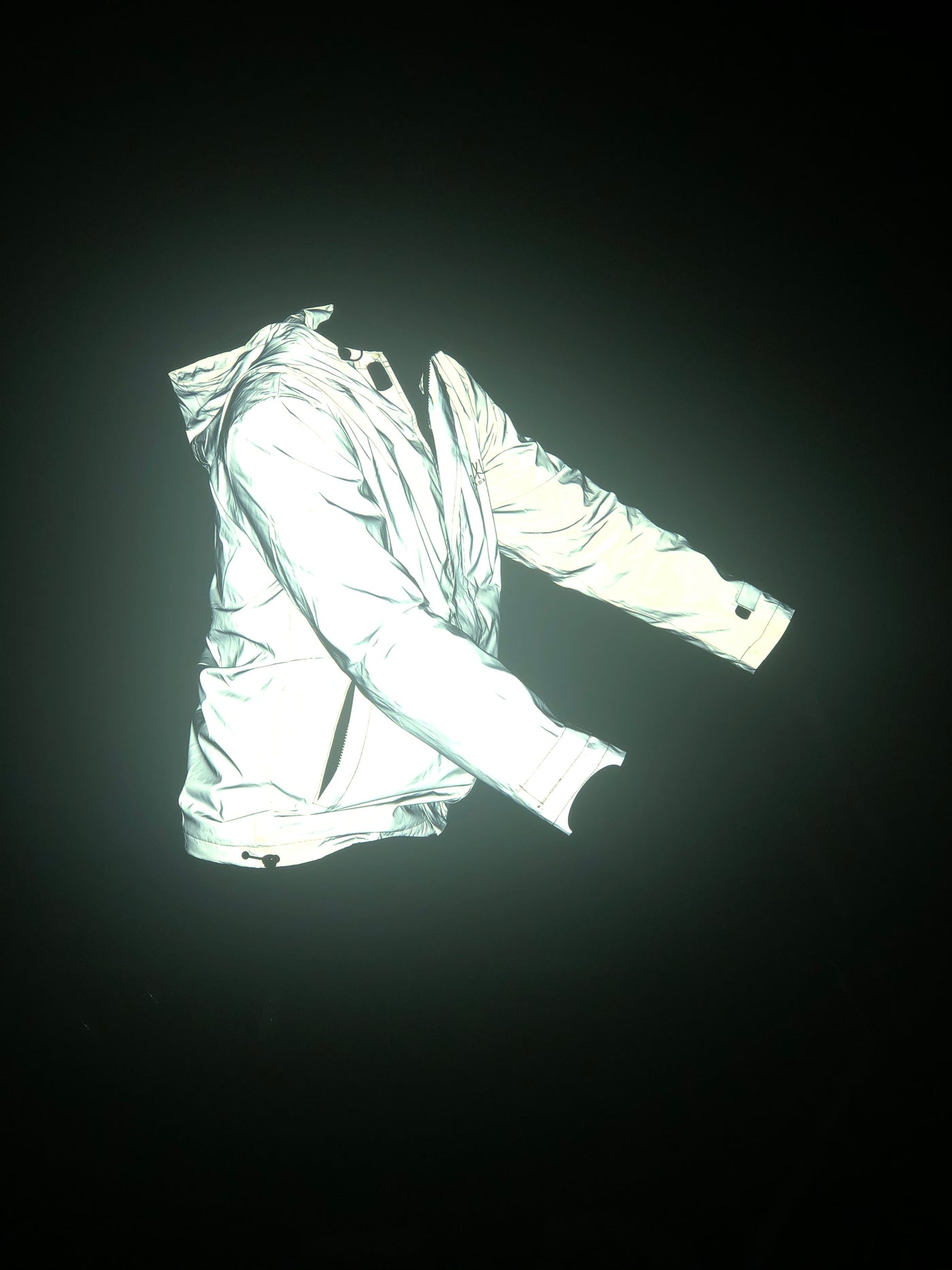 Riding a bike in the dark with a reflective jacket