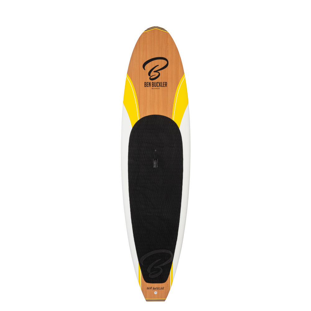 Black deck grip on a yellow and white paddle board